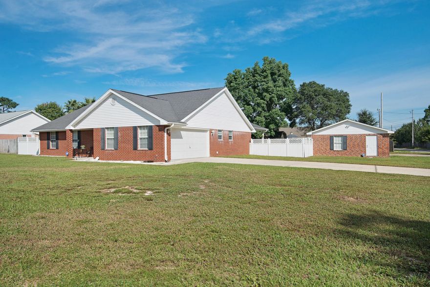 Spacious Backyard Paradise! This 4 BDR/2 BTH Brick Home sits on a very spacious.33 acre corner lot(one of the neighborhood's largest lots)Boasts separate electrically-wired detached 29 x 23-2 car garage for additional parking,lawn equipment,mancave,or entertaining room & w/ Security Lights. Home boasts a very meticulously well-kept home in immaculate condition. Click on photos,you wil see the quality & care of this homeowner.2005 New Roof-Rheem HVAC replaced 2012-Insulated Water Heater replaced 2011-GE Smooth Top Stove & Microwave 2015-Whirlpool Refrigerator 2016-Kenmore Dishwasher 1994-GE Washer/Dryer 2005-Backyard has complete covered & electrically wired paved 24 x 16 Patio and an inground Firepit-ADT Security System-New Door handles on Front Doors-Sprinkler System front yard on well