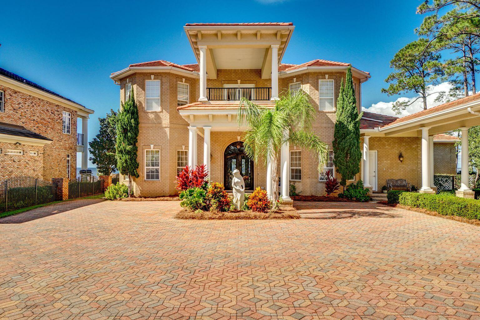 Southern French charm, on a lot that extends farther into Choctawhatchee Bay than its neighbors, beautiful year-round sunsets, dolphin, pelican, ducks, hawks & more. Sailboats, motorized vessels, paddle boards, canoes, etc. 5208 sqft heated & cooled, total covered space 8253 sqft. Can be 7 bedrooms, depends on how used, 6.5 baths, pool, screened patio & porches, porte-cochere, elevator, fenced, gated, 3 car garage with storage. Have parked 12 cars at one time. NO HOA, 35 KW-NG generator.