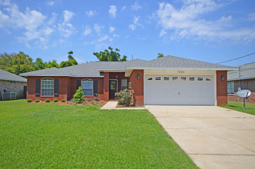 Move in Ready! This 4 bedroom 2 bathroom home has been updated. It has New Granite counter tops in the kitchen and bathrooms. New carpet in three of the bedrooms. New Engineered wood flooring in the Great room and the Master Suite. This home is a MUST see! Close to shopping and GREAT schools! Call today to schedule a showing.