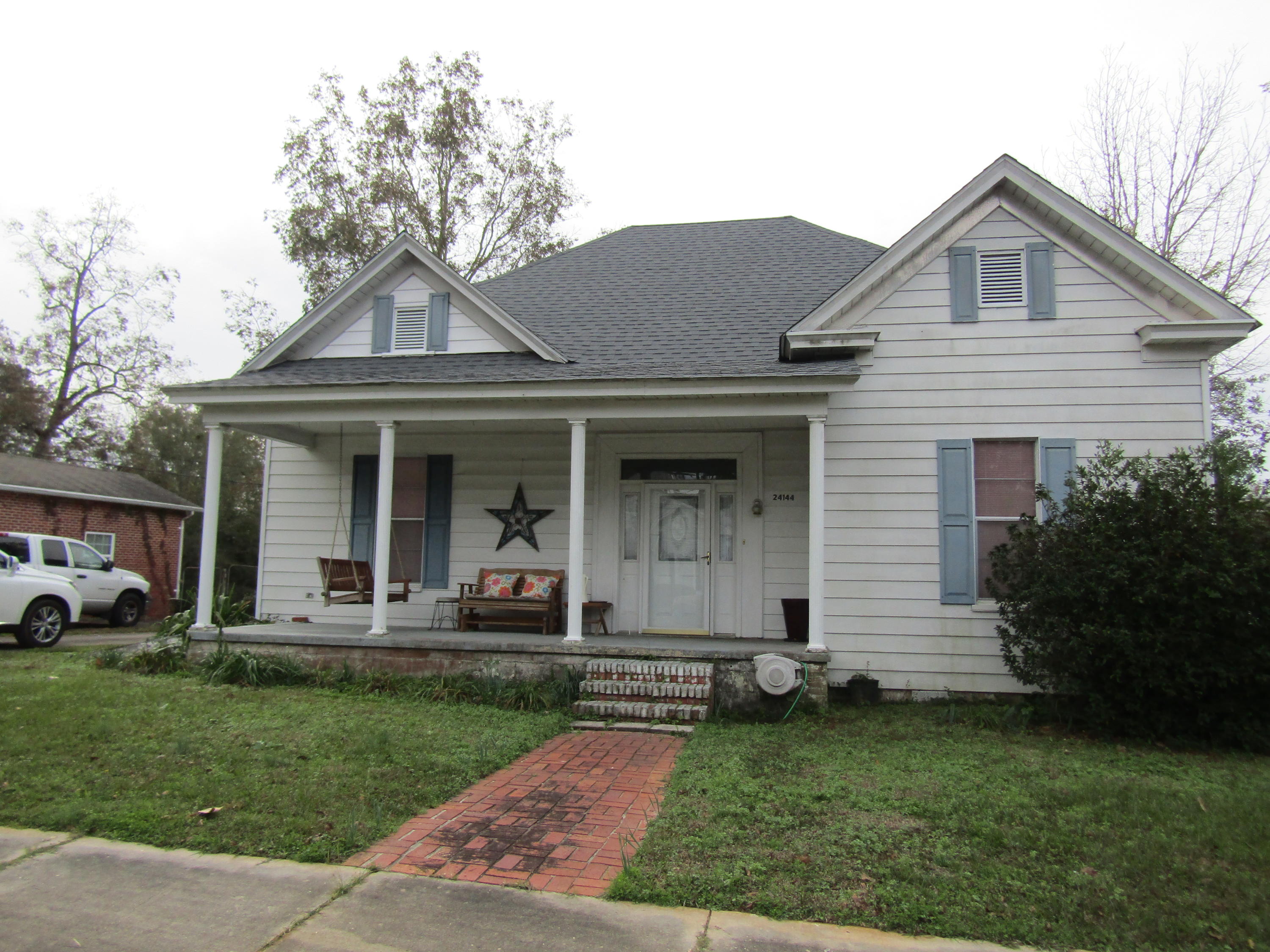 Beautiful city home only one (1) block from Lake Jackson in Florala, AL. This home is spacious and loaded with cabinets and storage. Has paneled walls and some laminated flooring and carpet. If you have been looking for an affordable Victorian Home to make your own then this is the home for you. Complete with city water and sewer, fenced backyard with 20x22' metal storage (possibly could be used for a garage) with cement floor. New roof 8/2020. Nice cozy living room with fireplace. Large Foyer with newly installed chandelier. Covered front porch, central air/heat. Ask about a pre-approval letter or proof of funds letter and lets view this beautiful home.