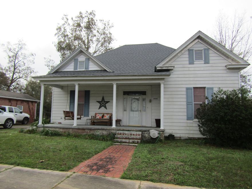 Beautiful city home only one (1) block from Lake Jackson in Florala, AL.  This home is spacious and loaded with cabinets and storage.  Has paneled walls and some laminated flooring and carpet. If you have been looking for an affordable Victorian Home to make your own then this is the home for you.  Complete with city water and sewer, fenced backyard with 20x22' metal storage (possibly could be used for a garage) with cement floor. New roof 8/2020. Nice cozy living room with fireplace.  Large Foyer with newly installed chandelier.  Covered front porch, central air/heat.  Ask about a pre-approval letter or proof of funds letter and lets view this  beautiful home.