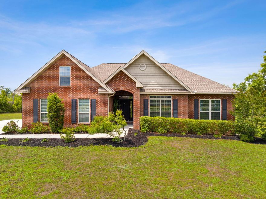 Welcome to your dream home in the desirable Magnolia Hills neighborhood! This stunning brick home offers a perfect blend of modern luxury and timeless elegance. With its spacious layout, beautiful features, and convenient amenities, this property is sure to exceed your expectations. Step inside this 4-bedroom, 2-bathroom gem and be greeted by the warmth of luxury vinyl flooring that flows throughout the main living areas. The vaulted ceilings create an open and airy atmosphere, enhancing the overall sense of space. As you make your way to the back of the house, you'll discover a delightful screened-in porch. The lush green yard is maintained by the convenient irrigation system. Additional features of this incredible home include a 2-car garage.