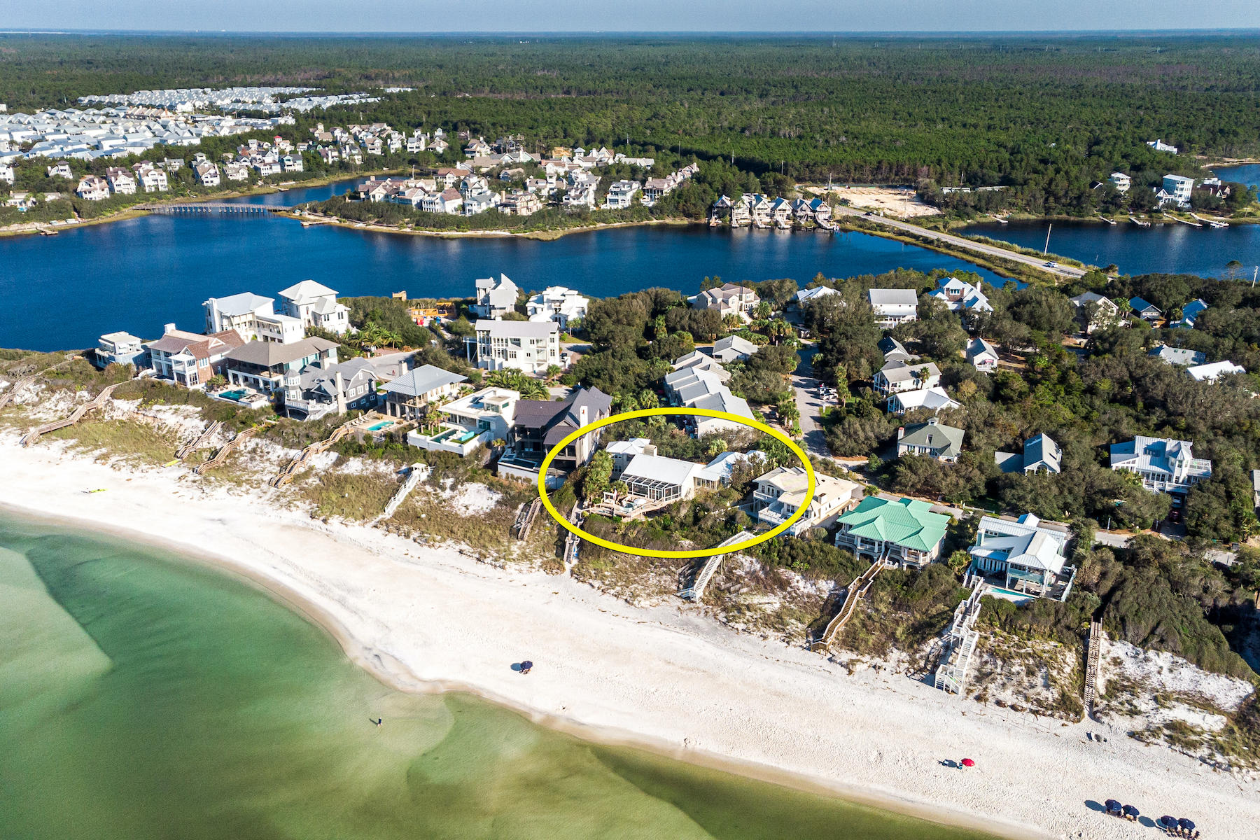 Impressive beach-front compound in a private, low-density community located on the east end of Scenic 30A in South Walton County, Florida, peacefully oriented on a peninsula between the Gulf of Mexico and the scenic, and rare, Coastal Dune Lake, known as Camp Creek Lake! This extraordinary estate includes a 3-bedroom, 3-bath main home, which was beautifully renovated in 2007, a 1-bedroom, 1-bath carriage home, garage, and secluded pool, all of which would be conducive to a primary home or secondary coastal retreat, or perhaps a robust income-producing asset for an investor who could also enjoy occasional use. Carefully designed to maximize the stunning setting, the home features gorgeous water views from the family room and kitchen, as well as the master suite. In addition, it offers...