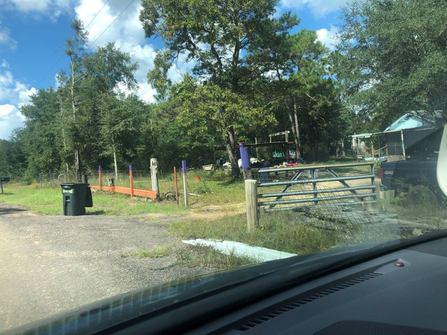 LARGE 6.6 ACRE LOT WITH 2 DWELLINGS IN PLACE. PROPERTY HAS 2 POWER POLES, 1 SEPTIC TANK AND 1 WATER METER.  LOT IS ZONED MUTI-FAMILY AND IS IN FLOOD   ZONE X. SELLER IS GIVING NO VALUE TO THE TWO DWELLINGS.