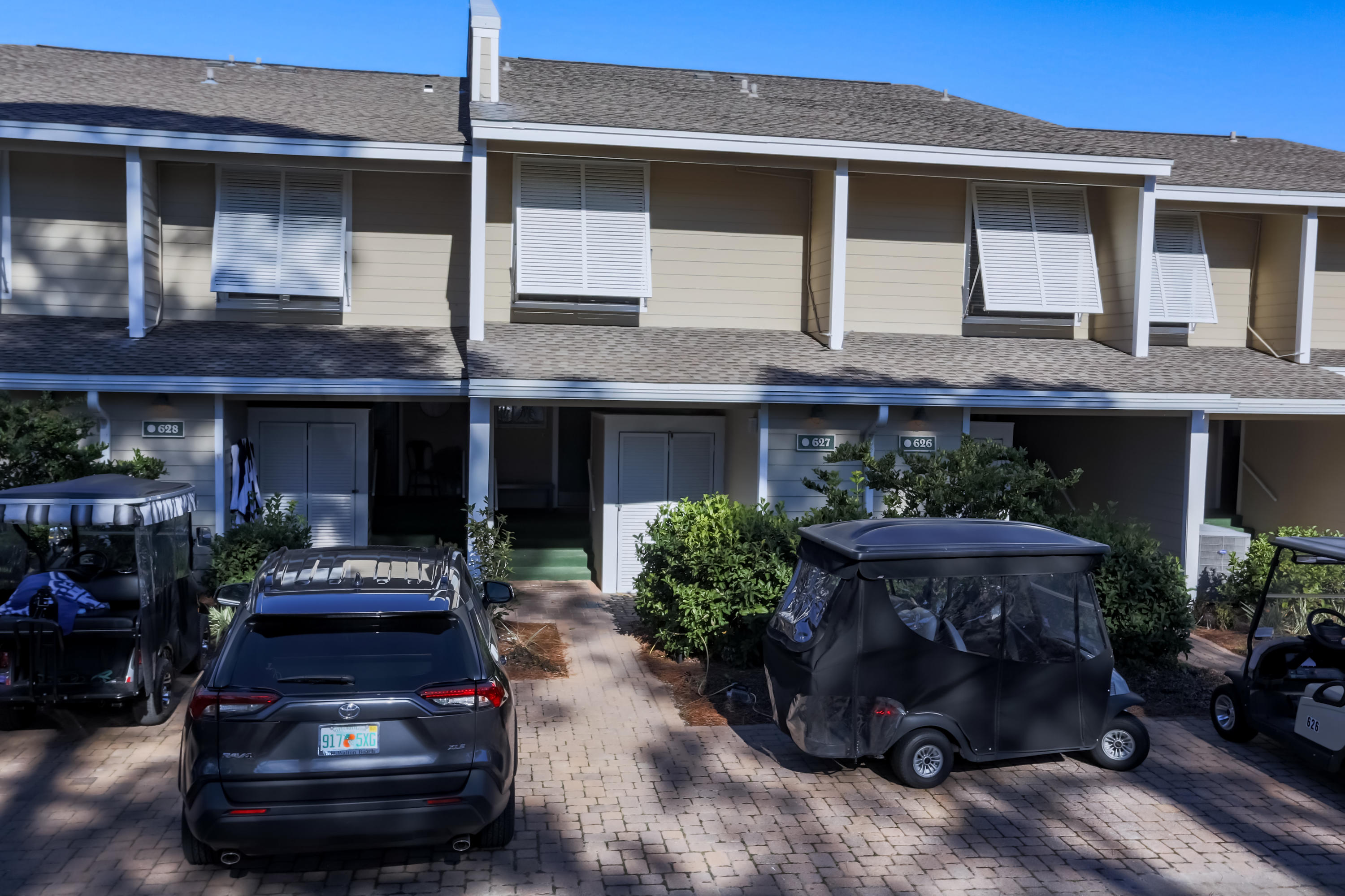 This is a must-see 'A' rated Bayou Village. You will love the open feel of this resort home, situated on a fully stocked lake and with views spanning across to the Choctawhatchee Bay. Beautifully remodeled, new furnishings, the first floor features tiled flooring throughout, new stainless steel appliances. 2nd floor has light colored LVP flooring and the master suite enjoys a balcony overlooking the lake. Throughout the home you'll find freshly painted neutral wall colors accented by coastal furnishings for a bright and airy feel. The screened outdoor patio off the living area is perfect for relaxing with tranquil lake and bay views.There is plenty of storage throughout this spacious two-story condominium, including a large exterior storage area for bikes, beach toys and more.
