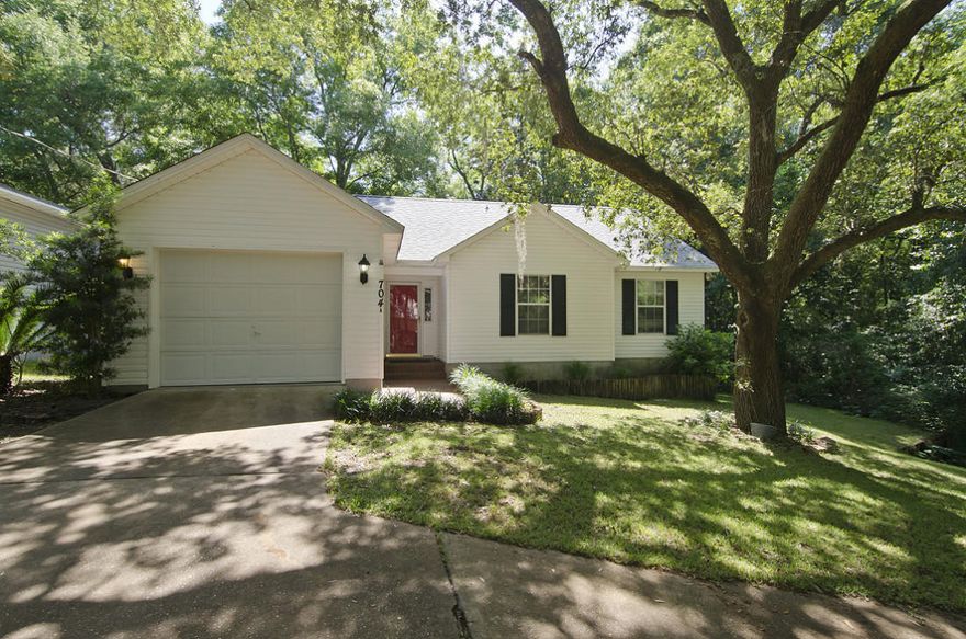 This beautiful home sitting on right at a half acre is ready to be called home. Boasting vaulted ceilings, laminate & tile floors throughout, recessed lighting and a beautiful fireplace that sets the mood as soon as you walk in the front door. As you walk out the back door you will see a HUGE deck that is ready to entertain, with steps that lead to a fenced in cleared back yard. This home is priced to sell, just minutes from schools, bases, airport and shopping. Don't miss your chance on this great home!!!