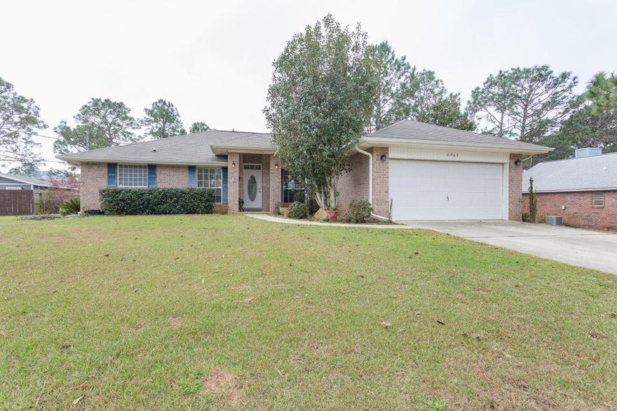 Under contract with a 72 hour kick-out clause. Taking back-up offers. This solid brick home is ready for everything from quiet evening's in to great outdoor get togethers. Upon entering you will notice the fresh smell of new flooring throughout the home. The bedrooms with new soft carpet and the main living spaces with luxury vinyl, tough, durable and good looking. The kitchen allows the cook to be present in the action in the living room and a few quick steps away from the Florida room. The split floorplan allows you to be separated from the rest of the home and the master bath is spacious and ready to help you start your day every morning. The two car garage will house your cars and if needed, the long driveway has even more room for guests!