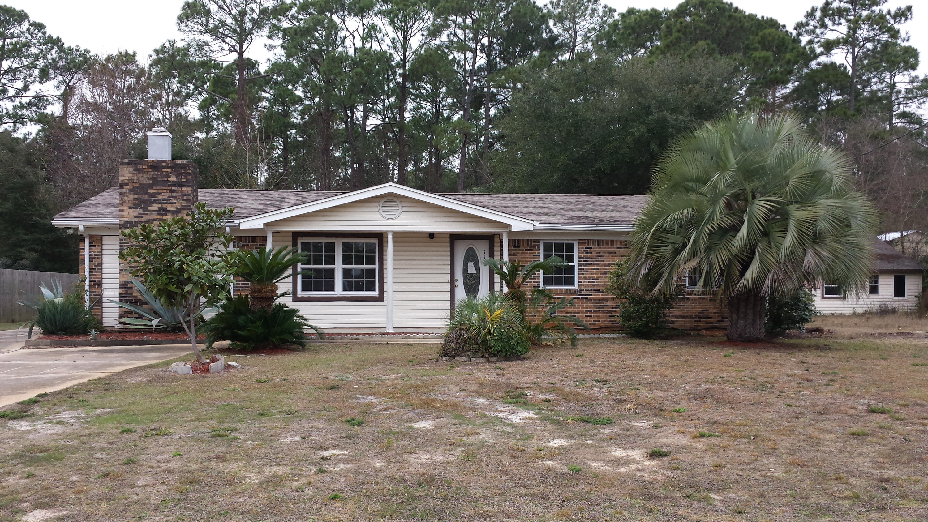 Nice starter home or investment rental. Located close to Hurlburt Field, shopping, golf, and some fantastic schools, this home is move in ready. Nice sized lot with detached garage and work area. Home has an enclosed patio. Home has new interior paint, new vanity, new stove, new ceiling fans, and some new tile. This home is a must see!!!