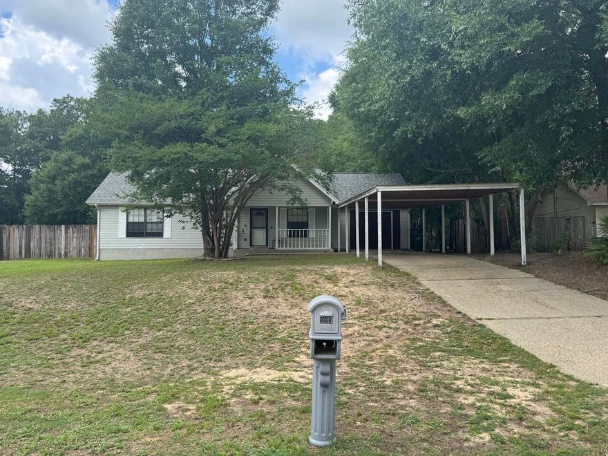 Located SOUTH OF I-10! This 3 bedroom 1.5 bath home on a 0.39 acre lot has a 2022 three dimensional shingle roof, a 2022 AC and gas furnace, 2023 septic system, newer paint, newer LVP flooring, as well as some new ceiling fans and light fixtures. The home offers a spacious living room, large open kitchen with dining area, primary bedroom with large closet and bathroom access. There are two additional bedrooms and a half bathroom located in the hall for guests. Don't miss the HUGE bonus room that could be used for many purposes: office, tv room, recreation room/pool table, indoor gym etc. The large lot offers a spacious front and backyard with mature trees. The backyard has two sheds being sold AS IS, outdoor patio, and fence. The driveway has covered parking for 3 cars.