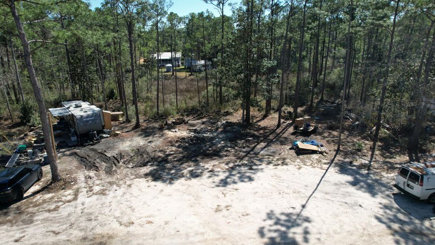 Discover the perfect opportunity to own 2 cleared parcels of land in the fast-growing area of north Santa Rosa Beach totaling 0.29 acres! This spacious lot is ready for your custom home or mobile home, with public utilities available for easy development. New home sites being built all around.Located just 10 minutes from stunning beaches, shopping, and dining, this property offers the perfect blend of convenience and coastal living. The lot backs up to the canal which is perfect for kayaking or paddle boarding. Whether you're looking to build your dream home, invest, or create a vacation retreat, this lot provides endless possibilities in a thriving community.