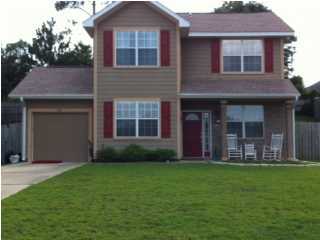 South of I-10! Call today to see this lovely two-story home in Sandy Ridge Subdivision w/ living room, well equipped kitchen, breakfast nook, dining room or office and half bath downstairs. Master bedroom and bath, plus two additional bedrooms and one additional bath upstairs. Back yard is privacy fenced, has a covered patio and lawn maintenance is included! This one won't last long! Call today!