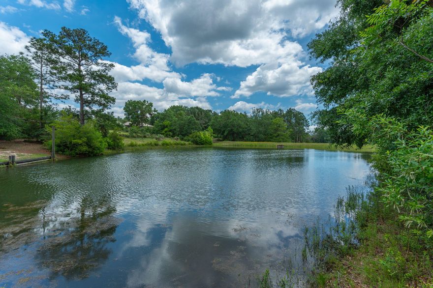 Escape to your own slice of paradise with this serene waterfront land lot overlooking Lake Roberts. Ready for your dream home (manufactured homes ARE allowed), or getaway cabin, or something new and fun like a container home?! LOOK NO FURTHER! Nestled in a peaceful setting, this property offers not just stunning natural beauty but also the convenience of modern utilities - ELECTRIC, WATER, AND SEPTIC TANK -  already in place, as well as NATURAL GAS available at the road. This property has been partially cleared with a circle drive already available to you as well as a semi-cleared walking path to the lake. Walk down to the lake and enjoy the views on the dock that it shared with the adjoining property. COME CHECK IT OUT TODAY!