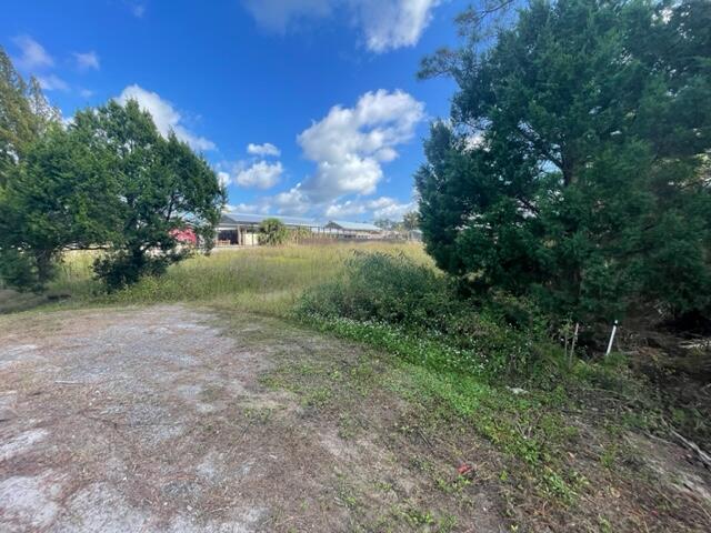 Large RV APPROVED parcel in the heart of Simmons Bayou has plenty of room for all of your beach toys! Enjoy an evening beverage of your choice while viewing Peek-A-Boo westerly sunset vistas of St Joseph's Bay. If you are looking for one of the best jumping off points to the sugar white and pet friendly beaches of Cape San Blas, or the charming and vibrant coastal town of Port St. Joe, just set your GPS only 5 miles in either direction. This 70' x 210' .32 Acre lot is cleared with water and sewer taps paid and installed. One of the most site ready lots one will find anywhere. All you need is your site plan improvements in order to make your pad and pole barn. Located only 1000' from Presnell's Bayside RV resort and just around the corner from St Joseph Bay Golf Club. Only 5 minutes to Port St Joe, 5 minutes to Salinas Park and close proximity to Cape San Blas and Indian Pass. This one checks all the boxes! Possible owner financing. See minor re-plat attached.