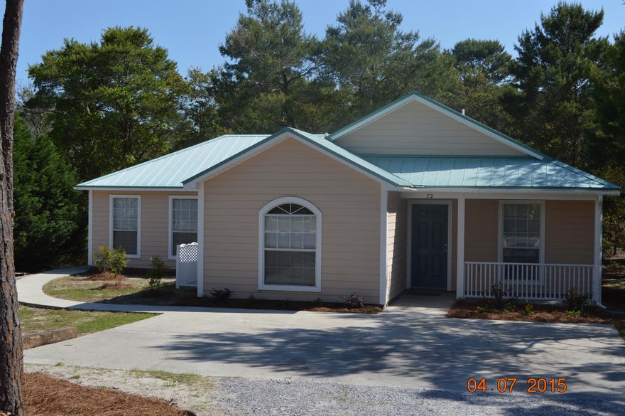This is a great beach cottage recently painted, new wood laminate floor in the great room area and carpet in the bedrooms of the maim house. Mother-in-law suite or guest quarters makes this home versatile. Walk to the beach or Gulf Place, or use the 18 mile bike path just up from the house. There is a golf course a short distance by golf cart or car but there are several close by if you ''must'' use your car. Did I mention, walk to the beach with no busy roads to cross ? This is currently the lowest priced home on the south (BEACH SIDE) and has recently been freshened with new flooring and paint. Don't miss this opportunity.. Vicki Street has recently been paved by the county.. Being sold subject to the existing lease.