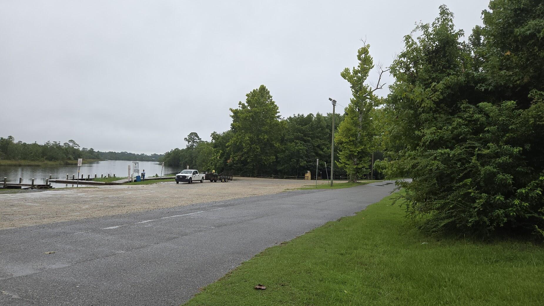 Here's your Chance to own WATER FRONT PROPERTY or almost WaterFront ! Directly across from Blackwater River Boat Slip so bring your boat! There's a Dock to Fish off . Set in the Historic District of Bagdad with all is natural charm. Beautiful Corner lot with no neighbors across street on 2 sides!Enjoy your '' morning coffee'' on the dock next to the water. Build on your own time. Lot is cleared and ready with just the right amount of trees and green space. Building on lot was used as a shop and has electric.No HOA fees to worry about ! Call your favorite Realtor today or just drive by and see this one!