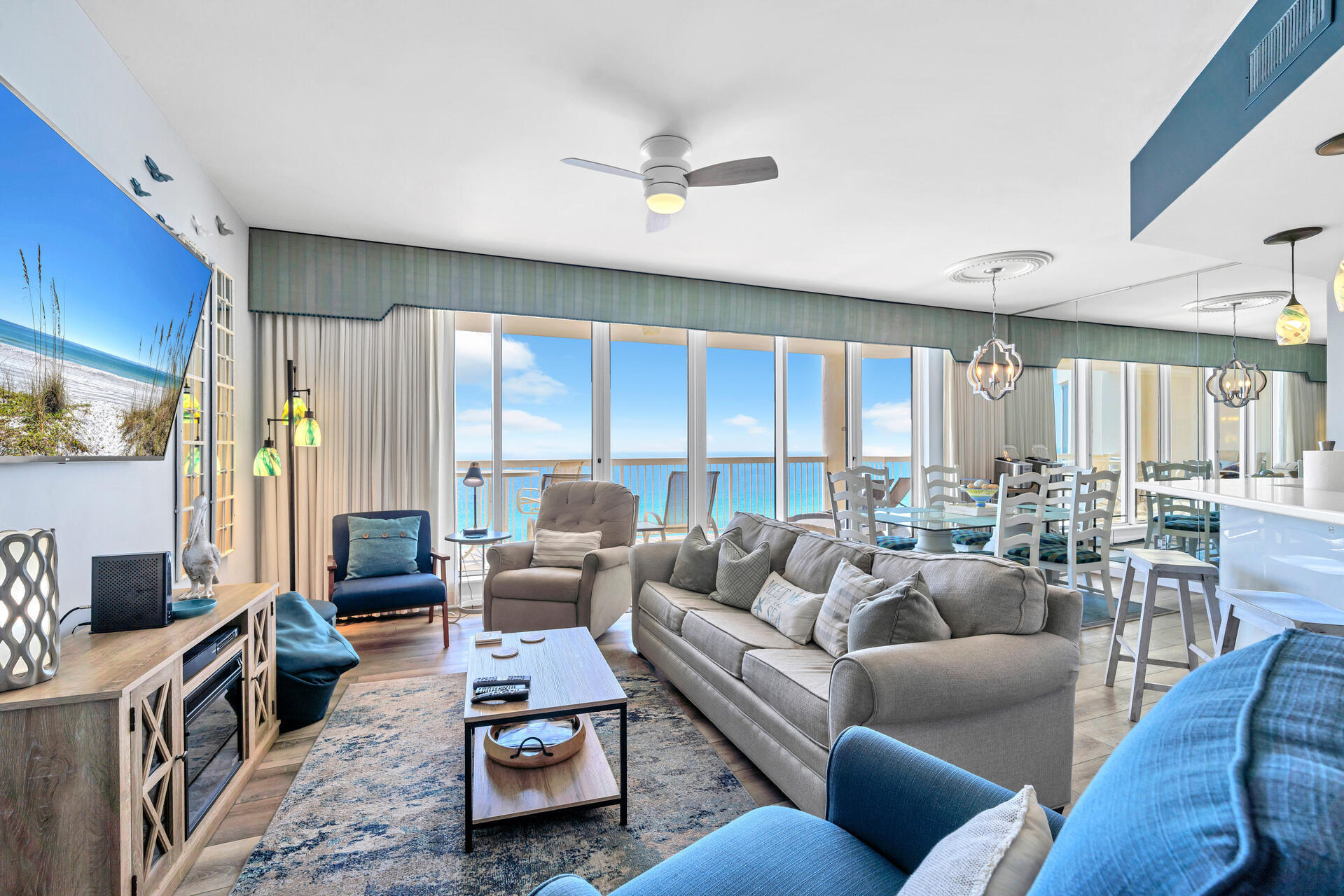 This Beautiful 10th Floor Unit Condominium located in the Very Desirable community of Silver Beach Towers East with mesmerizing 180 degree beach views east and west.  An entire wall of floor to ceiling windows provide nothing but water views from the living room, dining room, kitchen and master suite. Enjoy the large gulf side great room and kitchen - perfect for entertaining your friends and family or just relaxing and enjoying the Emerald Green water. Private Gulf Front Terrace overlooking the two swimming pools/hot tubs.  The private gulf side Master Suite makes this a perfect home or home away from home. Proven Rental with $170k in 2022, $140k in 2023 with condo down for 5 weeks in Spring for showers renovation & not advertising Late Fall/Winter, and $115k in 2024 with winter blocked 4.9 Star Review Average on VRBO & Owner willing to assist in transferring. Fresh paint throughout & most appliances & water heater recently replaced.