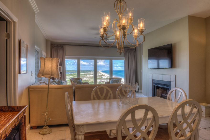 Rarely offered 3-Bedroom unit in the exclusive TOPS'L BEACH MANOR with incredible views! Great use of space with, in effect, a double master arrangement with 2 bedrooms facing the Gulf. Views are southeasterly over Four Mile Village and TOPSAIL HILL STATE PARK, and only 4 units on this floor makes this condo a true private retreat. The master suite has a large private balcony with gorgeous views (beautiful sunrise) and afternoon shade, while the other secondary master has access to the smaller primary balcony as does the living room. Smartly renovated kitchen with granite, stainless steel appliances, front-loading washer/dryer set beneath raised granite counter. Beach Manor offers the ''wow factor'' view from the living room!. The entire unit is updated and very tastefully decorated.....