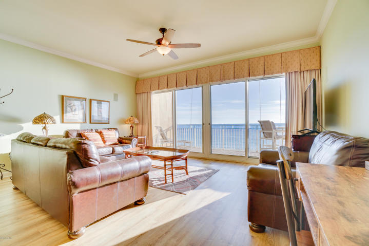 This Sterling Beach condo is the thing of which dreams are made. Almost 1500sqft of seaside luxury with a toes-in-the-sand location on the famed beaches of Panama City Beach...which conjures up images of sun-splashed days of swimming, biking and relaxing. This professionally decorated condominium boasts 10 ft ceilings with crown molding in the Great room and Master bedroom. This unit's gulf front great room is 16x24 feet with a wall of glass leading to a 32x8 foot private balcony, providing the ultimate alfresco living and entertaining environment. This unit has been recently renovated and meticulously maintained and shows pride of ownership with its plank flooring, custom bathrooms, high-end furnishings, and warm decor.