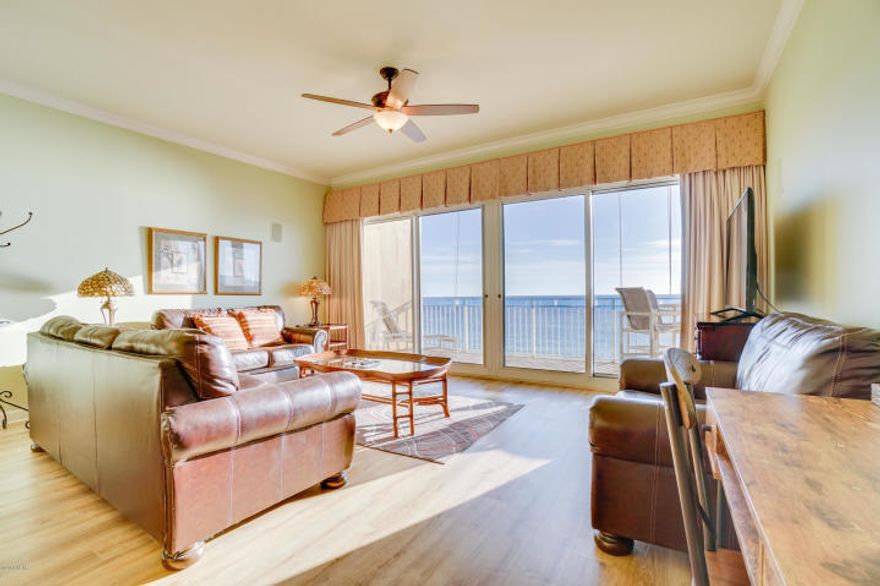 This Sterling Beach condo is the thing of which dreams are made. Almost 1500sqft of seaside luxury with a toes-in-the-sand location on the famed beaches of Panama City Beach...which conjures up images of sun-splashed days of swimming, biking and relaxing. This professionally decorated condominium boasts 10 ft ceilings with crown molding in the Great room and Master bedroom. This unit's gulf front great room is 16x24 feet with a wall of glass leading to a 32x8 foot private balcony, providing the ultimate alfresco living and entertaining environment. This unit has been recently renovated and meticulously maintained and shows pride of ownership with its plank flooring, custom bathrooms, high-end furnishings, and warm decor.