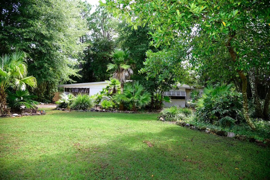 Charming Florida cottage tucked away in lush, landscaped Fully renovated 3 bedroom, 2 bath home on a large corner lot in a quiet neighborhood! Many upgrades include stainless steel appliances, white shaker cabinets, granite & vinyl plank flooring in the kitchen, dining and living areas. Updated guest bathroom down the hall with 2 guest bedrooms. Further down the hall is the master suite with very large walk in closet and private bathroom. Great views from all windows. Large screened in porch overlooking the huge backyard which boasts a fire pit and elevated gardens. Owner will consider pets with certain restrictions. Any pet must be spayed/neutered, housebroken, and current on all shots. Non refundable pet fee is required. NO Smoking. Any person 18 years old or older must complete separate Applications. Tenants required to have renters liability insurance.