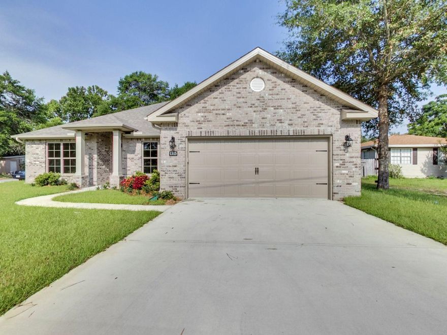 Move in ready 2018 all Brick 4 bedroom 2 bath Watree Construction home. This home has all of the features you would want in a new home. All the main living areas are tile flooring, 9 foot ceilings, the living room has trayed ceilings with crown molding. The kitchen has dark wood cabinets, granite countertops, stainless appliances, breakfast bar, and drop down lighting. The master bedroom has trayed ceilings, crown molding, large walk in closet. The master bath has a large soaking tub, walk in shower with glass doors, double vanity with a large framed mirror. There are 3 bedrooms on the other side of the house and one of them could be set up as a perfect office space. On the back of the house there is a 10 X 13 covered patio for enjoying the Florida weather.