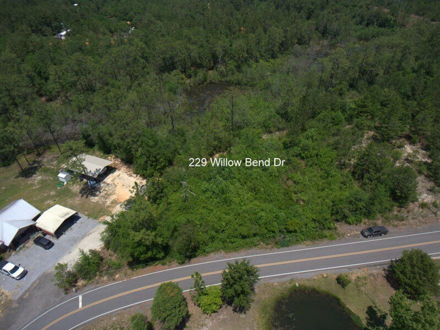 Nearly 1/2 acre of vacant land on a black top road. There appears to be surface water on rear portion of property and this could make for a unique homesite with a creek or pond possibly. Take a closer look and see of this is the next spot for your dream home or your next weekend getaway. There is paved access and has close proximity to I-10, Crestview, Niceville , Eglin AFB and Defuniak Springs.