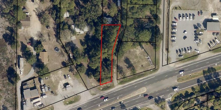 Highway 98 Commercial lot located on the north side of Navarre Parkway.  It is .22 acres, with the dimensions of 44ft. wide by 225ft. deep. Access is by a deeded private dirt road from Hwy 98.   The property is zoned HCD and  would allow for various business opportunities.  The Seller was approved for Variance and Conditional Use approximately 5 years ago.  Neighboring Lots are also available for sale for a combined total of 1.13 acres, see MLS #'s 865514, 865515, 865517, 865519