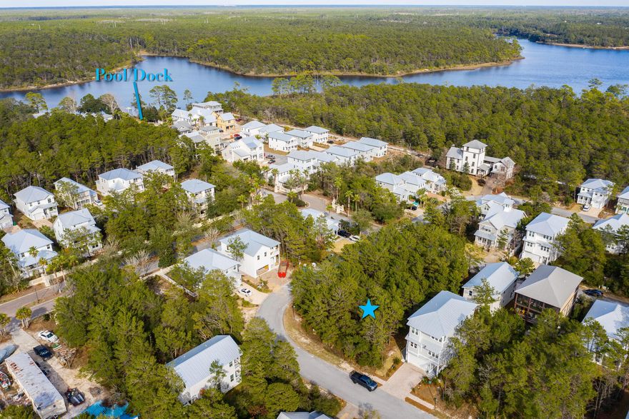 Rare and amazing lot in one of the most desirable neighborhoods in Inlet Beach. Seller also owns the two adjoining corner lots, and both are available for purchase. Grande Pointe is a highly sought after community with great amenities featuring large pool overlooking Lake Powel, Club House and  lake access with dock . The beach is just a short walk, bike ride or golf cart ride. Restaurants and shops are all within walking distance.