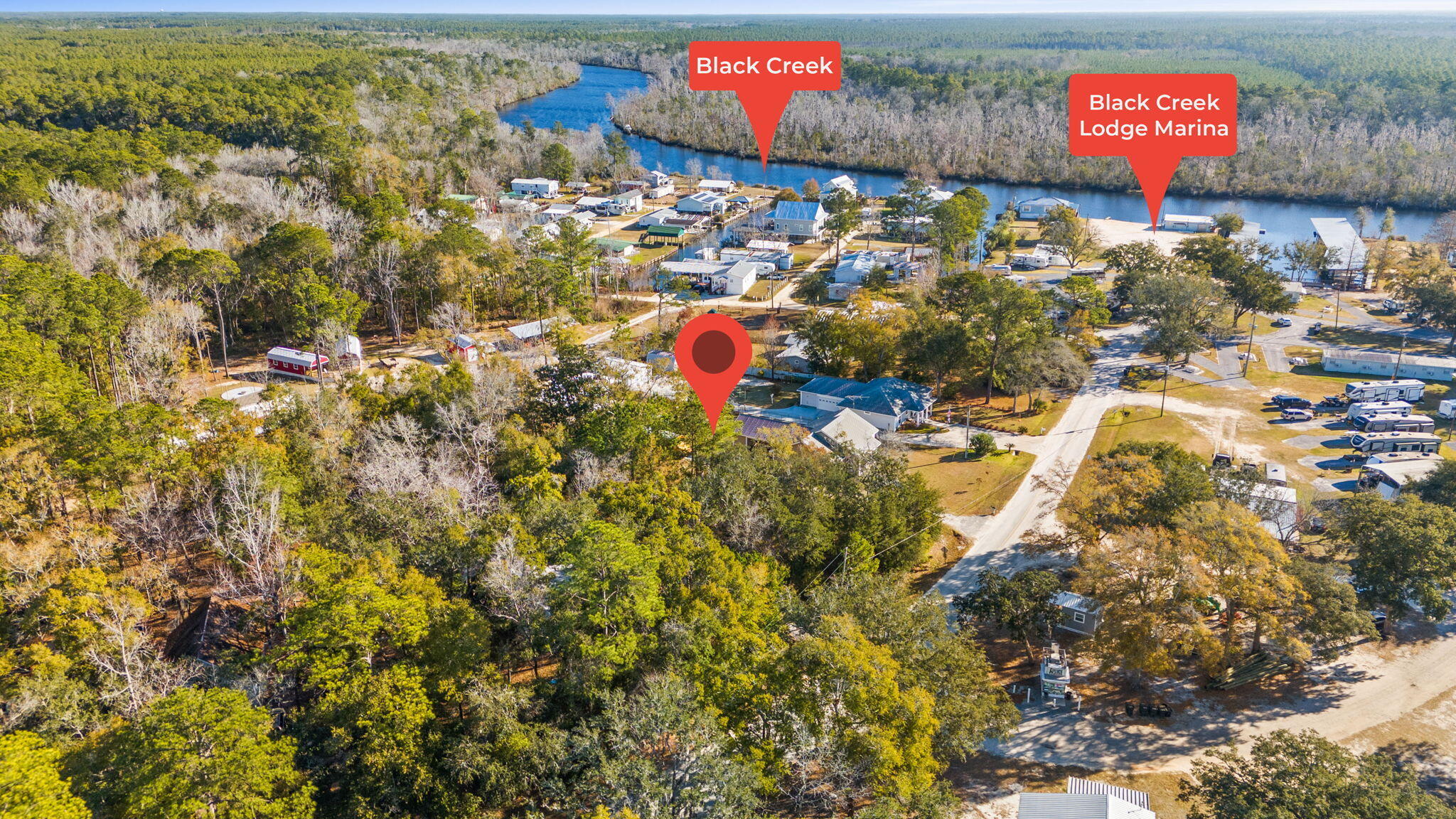 PRIME LOT LOCATION AT BLACK CREEK!! Great opportunity to build your dream home on this generous, over half-acre lot in Freeport, FL. Just steps away from Black Creek Lodge Marina, launch your boat and be in the open waters of Choctawhatchee Bay in no time. This versatile property is perfect for a primary residence, vacation retreat, or a fishcamp rental investment. Located off the beaten path, yet conveniently close to all the amenities, you're minutes from the Beaches of South Walton, 30A, Silver Sands Premium Outlets, Grady Brown Park, Publix, Freeport's new eateries and much more. Don't miss out on this rare opportunity!