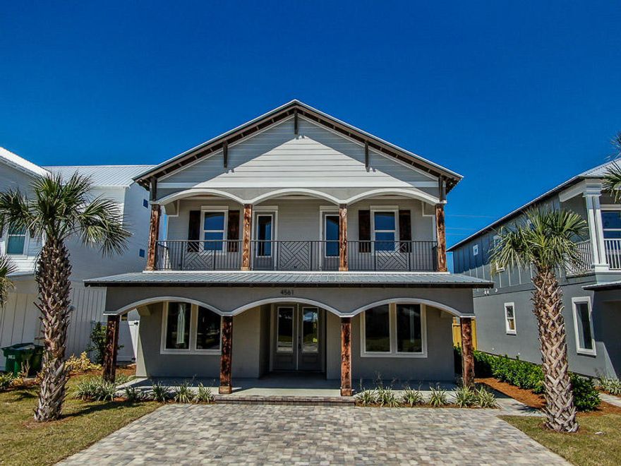 $166,000 in Projected Rental!!! Custom new construction in Crystal Beach. This home has 6 bedrooms 51/2 baths with a large day room upstairs that could be a bunkroom or additional bedroom . This is a fully upgraded home featuring all tile main floor and Cortec Laminate wood floors on the second level, Custom cabinetry throughout, tongue and groove on some ceilings, wainscoting, Granite counter tops in Kitchen and all bathrooms, custom tiled showers with European sliding glass doors, Oil rubbed bronze fixtures and hardware, burnt cedar columns, tiled balconies, Mienke fans and stainless appliances. This home also features a heated custom saltwater swimming pool with hot tub. The pool is also automated and can be controlled by your smart phone. All of this a short walk to the Beach Access