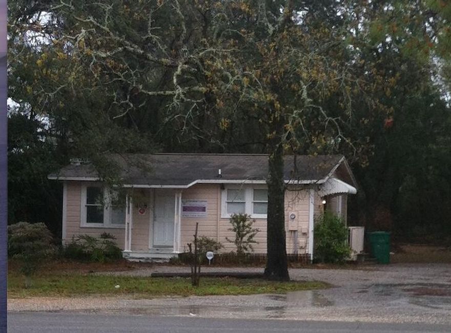 2br 1 bath house on .46 acres. zoned Mixed Use.