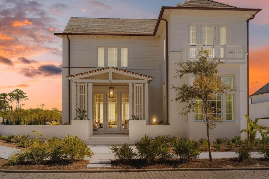 Nestled within the coveted  Kaiya Beach Resort community, this newly constructed edifice encapsulates a timeless coastal design with a unique modern flair. A unique collaboration between renowned Khoury & Vogt Architects and the talented build team at Romair  Construction, the masterfully planned layout spans two levels with over 3,700 square feet of living space. Upon initial approach, the dual hanging day beds in the entryway set the precedent for the overarching theme of relaxation and rejuvenation which can be appreciated throughout. Designed with family gatherings and entertaining in mind, the spacious living and dining areas are centered around the Chef's kitchen featuring custom cabinetry, marble tops, and a luxury appliance suite with built-in espresso machine.