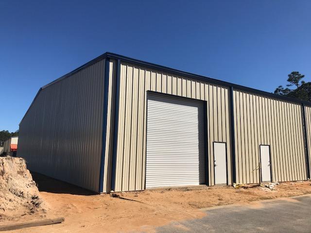 Great warehouse/office space available right off highway 98. Owner willing to build out warehouse for tenants needs. Currently laid out to include 2 offices, lobby, bathroom and kitchen with approximately 2000 sqft of warehouse space. There is an opportunity to build a mezzanine to add an additional 3000 sqft of storage area for a total of 5000 sqft of warehouse space. Features include parking for up to 6, a 14 ft roll up door, as well as front and rear access.South Walton Business Center is a gated business community located a half mile north of Highway 98.Tenant can occupy unit as soon as March 1st.