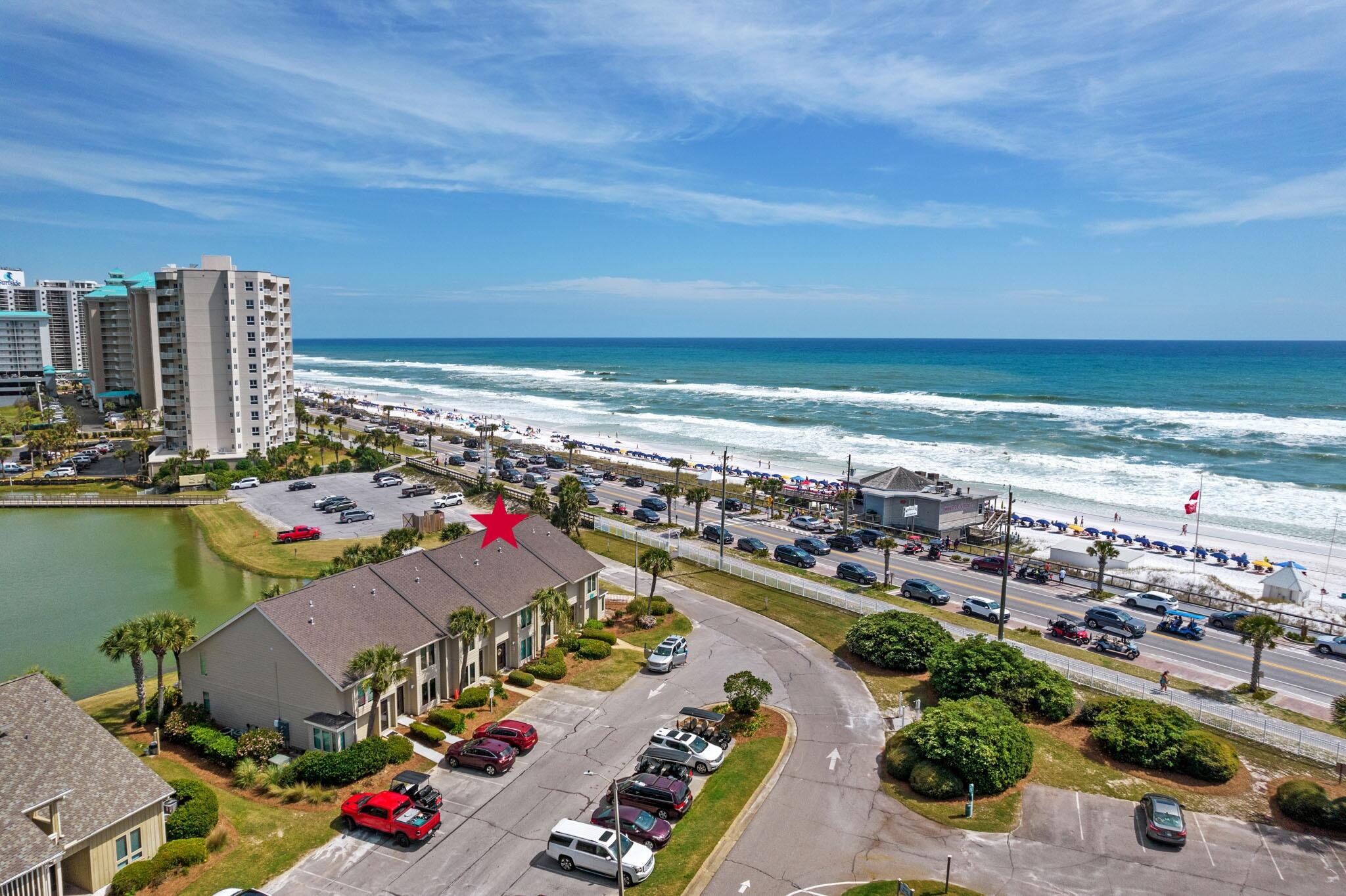 Check out this unique, 2 story, Seascape unit featuring lake and Gulf of Mexico views! Located in the last building, just steps from the public beach access and Whales Tail! Upon entering the unit, you will find one of 2 living rooms which can also be converted into a 3rd bedroom. Perfect for entertaining, you will love the open floor plan with views of Sawyer Lake. The kitchen features granite countertops and stainless appliances. The 2nd floor offers two bedrooms with ensuite baths! Full size washer and dryer are located in a convenient laundry closet between the two bedrooms with additional storage. The master bedroom has a queen bed and flat screen tv. Enjoy morning coffee watching the waves from the balcony located off the master bedroom. Second bedroom has a queen bed and flat screen tv. Unit to be sold fully furnished and turnkey making this unit a great home, second home or investment property! New on demand water heater installed recently and NO CARPET makes this unit ready for care-free living!
Recent condo assessment has been paid in full and work has been completed to include new external siding, doors, windows, screens and gutters. Make your appointment today to see this gem!