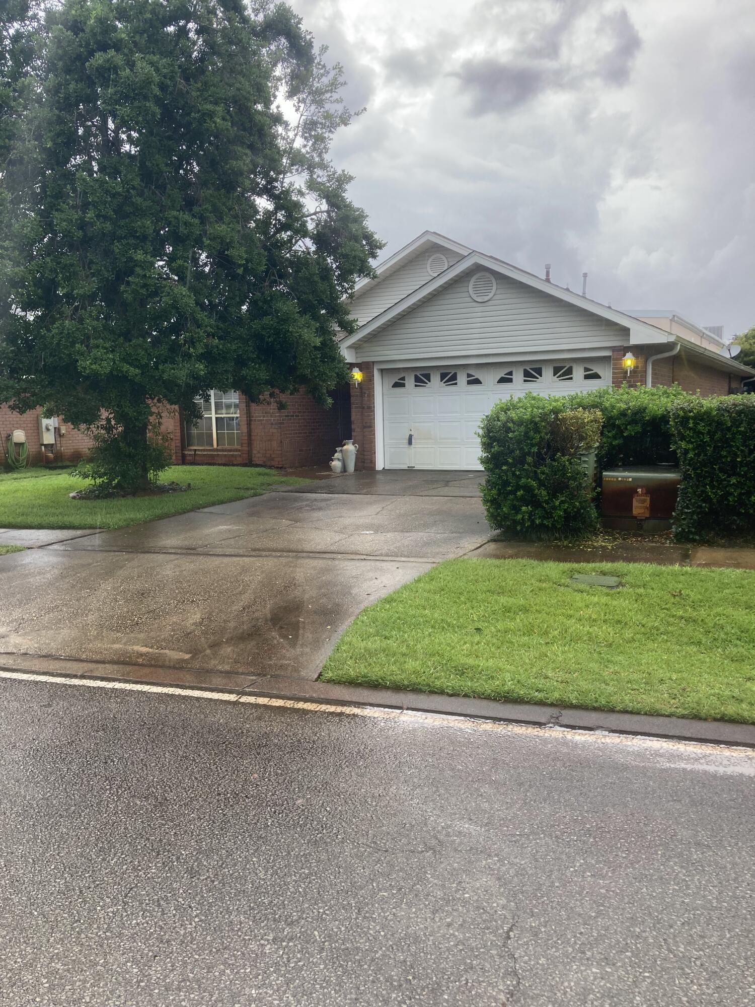 SHORT TERM RENTALS ALLOWED. This is one of the larger 3bd/2bth homes in the neighborhood. Unfurnished and the inside needs updating. 2 CAR GARAGE. NEIGHBORHOOD POOL. This home will need a new roof and it can be installed before closing. Roof Bids of $13,500 to $15,000. Enclosed deck on the back. Fully fenced. Lots of potential and priced to sell to someone that wants to upgrade this home and personalize it. Close to the beach.