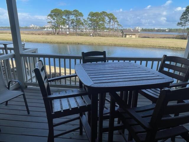 A rental powerhouse with almost $40K net earnings in 2022! Already over $20K on the books for 2023! This lower level, bay facing condo is truly a hidden gem within the resort boasting parking right out front, a community pool and front row seats to one of the BEST VIEWS WIHIN SANDESTIN(r)! Overlooking the signature Links 14th fairway, the marina, daily sunrises and weekly fireworks display. It doesn't get much better than this,,,,,