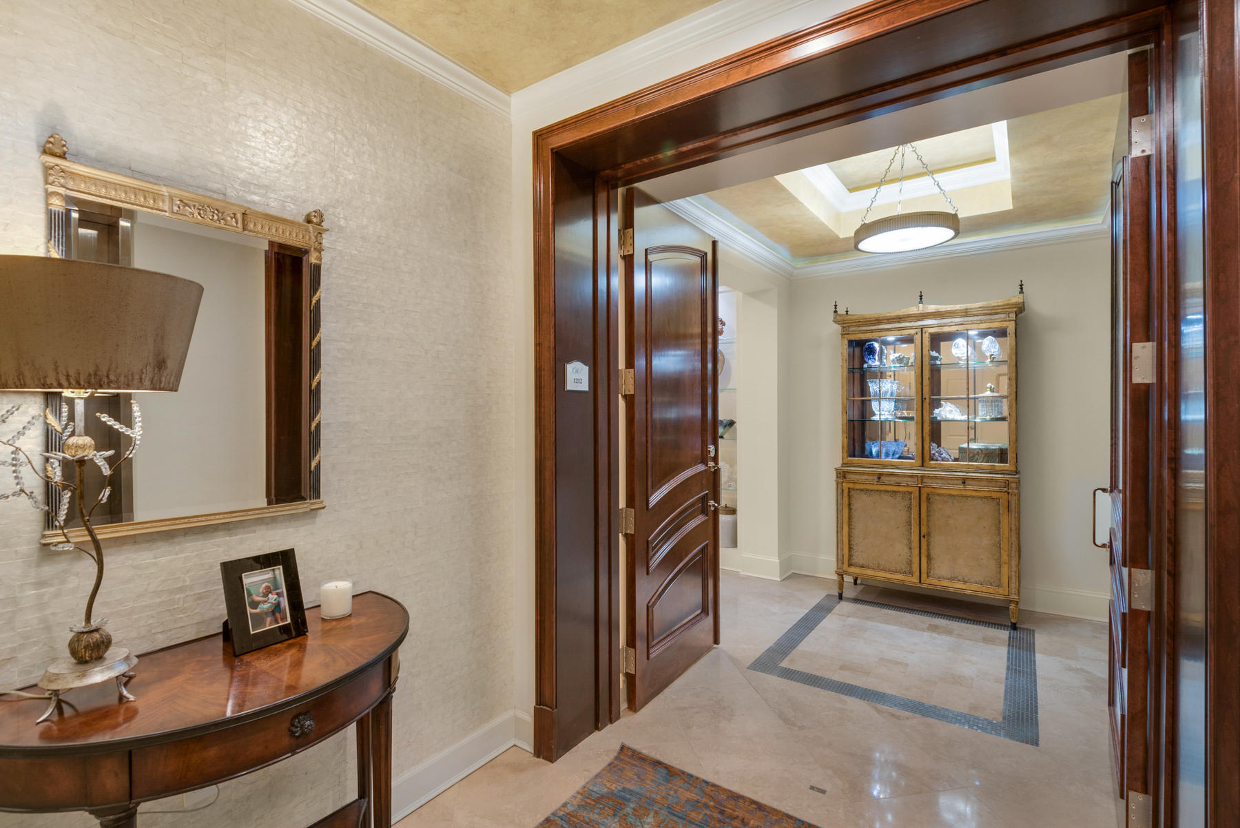 This highly sought-after Darlington floor plan on a high floor in building 3 rarely comes available. This unit was totally renovated when the current owners purchased and no expense was spared. This condo is a must see as there are too many upgrades to describe. The elevator takes you directly to your private elevator foyer. Enter the unit through beautiful mahogany double doors. Upon entering the condo there are 2 guest bedrooms with private baths and a laundry room. As you walk down a gorgeous wide hallway there is a study/family room and a living room divided by a two-sided gas fireplace. There are 2 spacious terraces as well as a walkout balcony off the master bedroom. One terrace can be accessed from one of the guest bedrooms as well as the family room. The other is accessed
