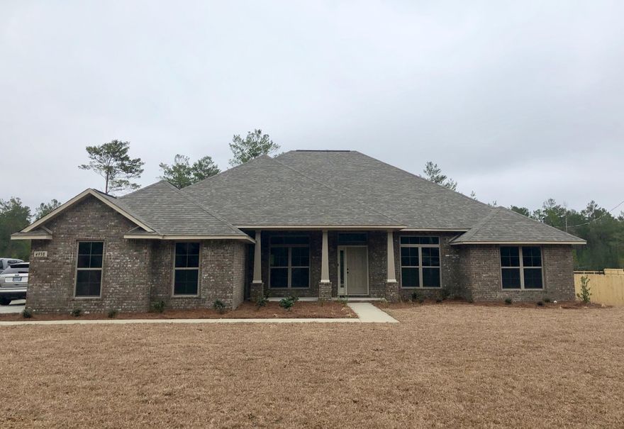 Our popular 3019sqft home sits on 1 acre with a 3-Car side-entry garage. This plan features larger bedrooms and an open design, with a beautiful kitchen that overlooks the spacious Great Room. The kitchen is adorned with custom-made maple cabinets, recessed and under-mount lighting, granite countertops, stainless steel appliances, and a large walk-in pantry. A wide Florida Room with large windows overlooks a backyard with privacy behind. This home is energy efficent with a 14 seer HVAC and low-E vinyl windows. Nichols Creek has easy access to I-10, and the sugar-sand beaches of Navarre are less than a 30-minute drive away!Thomas Homes was the winner of multiple Parade of Homes awards in 2017, and has been claim-free since 1993!