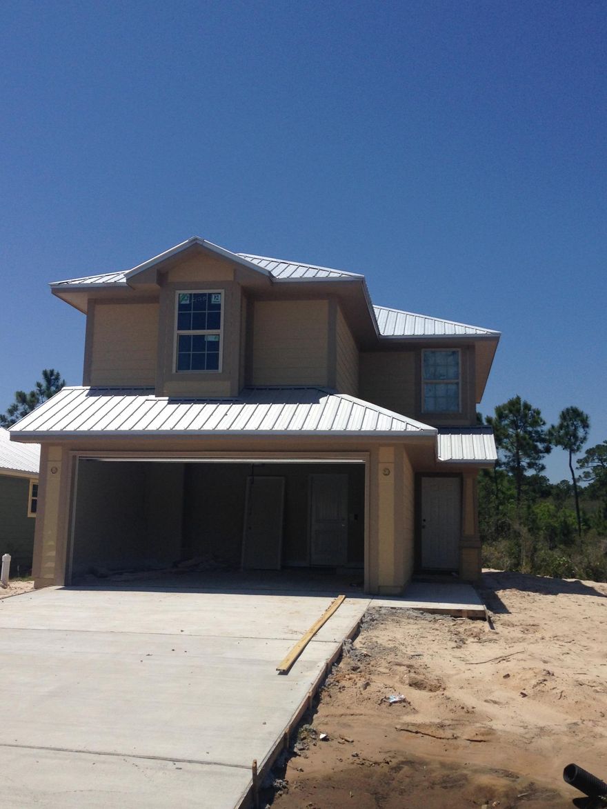 New home being built on one of the last lots available in desirable Eagle Bay subdivision! Walk to Bay access - just 2 blocks away. 3BR/2.5 bath two story home on corner lot! Hardiboard with metal roof, 2 car garage, sprinkler system with well, hurricane window and door protection. Interior features include granite in kitchen and baths, bull nose corners, Moen fixtures, GE stainless appliances and more. One year builder warranty and 10 year Bonded Builder Warranty. Low association fees, plus, buyer can join community pool for $200/year . Builder pays closing costs with approved lender. (Except prepaids). Buyer incentive available for month of May 2015!