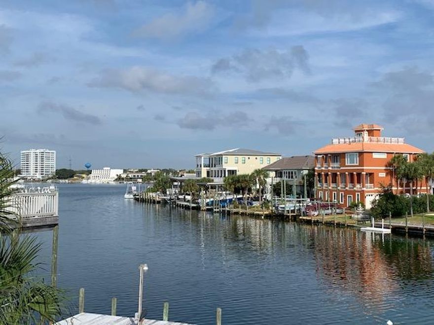Outstanding View of converging waterways & Harbor. Quick Easy Access to the Gulf. Quick walk to the Beach. Sprawling deck area with Electricity. Many updates Through-out. 3 Season Florida Room with a view. Expansive Kitchen with lots of cabinets, Island & Breakfast Bar. Newer Roof & Garage door. Back of House 6 New Sliders & French Door. All 3 Bathrooms Updated, Seamless glasss. Master bath His & Her showers heads with shower wands. All 3 bathrooms Travetine. & granite. Newer Flooring through-out. Wood Burning Fireplace Stone all newer. Exterior & Interior painted 2019. All newer baseboard & Crown through-out.Pool with Spa. All Newer Lighting. Fenced in yard. White PVC Fence 2018. Circular Driveway, Pavers. Lushly Landscaped. All appliances convey. Buyer to verify dimensions