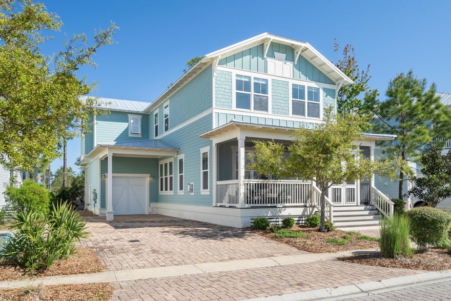 Step inside this idyllic four bedroom, three and a half bath NatureWalk home. Although this home is not a rental, it is turnkey and ready to go. Located across from a tranquil pond in the front a nature preserve in the back this home doubles as an ideal primary/vacation home as well! Featuring 10 foot ceilings, hardwood floors, stainless steel Cafe series appliances, coffered ceilings, a luxurious gas fireplace, numerous outdoor living areas, the list goes on and on! On the main level there are two screened in porches, one in the front and one in the rear of the home. Upstairs you'll find all four bedrooms, one of which has been converted to a bunk room. One of the guest bedrooms features a spacious ensuite bathroom.