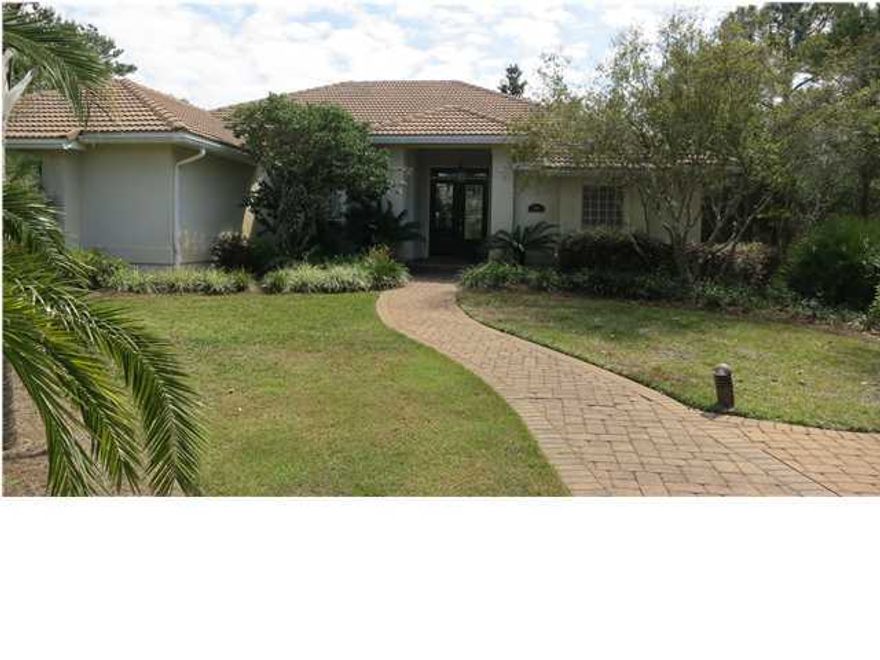 Destiny East is one of the most popular subdivisions in Destin! This is a great home for full time living or a vacation rental. You will love the wonderful open split bedroom floor plan and the attention to detail in the upgrades. This home boasts 2 living areas, a formal dining room and eat in kitchen. Enjoy cooking on the fabulous Viking gas range and keep your food warm in the warming drawer. Ceramic tile is in all the living areas, kitchen, hallways and bathrooms. The master bedroom has a large sitting area, with large sliding doors overlooking the back deck and beautifully landscaped yard. The master bath has his and hers closets, as well as 2 vanities with beautiful granite. There is a nice laundry room with sink and cabinets. The beautiful furniture, custom original art