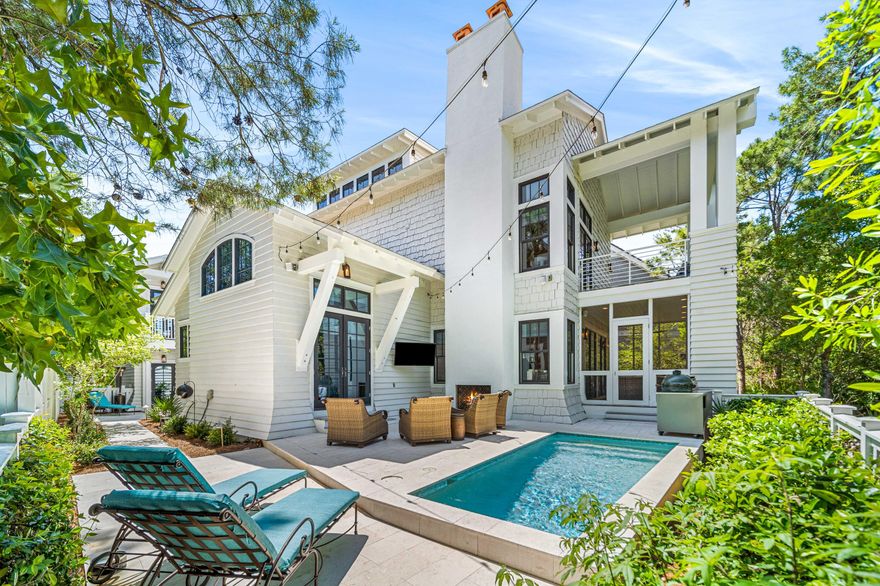 Experience unparalleled privacy in this stunningly updated WaterSound Beach residence with a four-bedroom primary home, one-bedroom carriage home over a detached two-car garage, and a delightful outdoor courtyard with heated swimming pool. This immaculate home boasts a tranquil location in the heart of the community alongside a meandering creek, perfectly situated on a peaceful cul-de-sac. Clean lines and classic interiors welcome you into light-filled spaces designed with comfort in mind. The open living and dining areas feature two separate sitting rooms, a gas fireplace, and custom draperies while the kitchen offers quartz countertops, Wolf and Sub-Zero appliances including an ice maker, wine refrigerator, and beverage drawers, and a showcase designer counter-to-ceiling backsplash. Access a cozy screened porch from the primary living space that leads to the outdoor courtyard complete with swimming pool, patio, grill, fireplace, and outdoor TV all overlooking a wooded preserve. This property features two exquisite master suites on both the first and second levels. The first-floor master retreat boasts soaring ceilings, a spacious walk-in closet, and doors that lead directly to the heated pool and courtyard. The second-floor master suite features a charming fireplace and a sprawling covered porch overlooking the secluded backyard and picturesque creek. Both suites offer spa-like ensuites with luxurious finishes, dual vanities, separate soaking tubs, and walk-in showers. A second level guest room has both an ensuite bathroom and a private balcony while the third floor serves as the ultimate retreat with 4 custom built-in bunks, a private bathroom, and a living area with gulf views, and a wet bar. Host guests comfortably in the carriage home with separate living and sleeping spaces, an office nook, a full kitchen, and a private bathroom. With features and functions well suited to either a full-time residence or an investment property, this rare gem is a must see!
Sophisticated and stylish, the gated WaterSound Beach community is located south of Scenic Highway 30A offering homeowners a rare sense of seclusion yet with easy access to area activities. Amenities include swimming pools, a puttering park, community green spaces, a state-of-the-art fitness center, and private boardwalks to one of the most beautiful miles stretches of coastline in the area.
