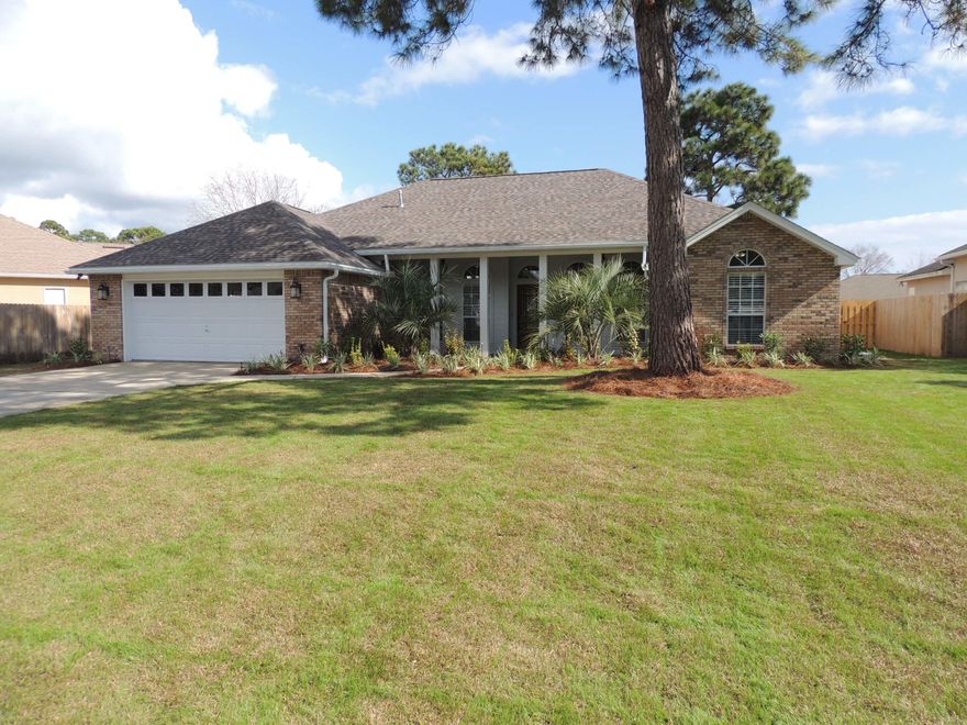 Beautifully remodeled and updated open floor plan home in Raintree Estates. The kitchen has new white shaker wall and peninsula cabinets with a complementary grey shaker island all with marble counter tops. New black stainless appliances and travertine tile floors complete the picture. There are both a breakfast room and separate dining room. Both baths have new travertine floors and vanities with marble tops. New hard wood floors in all living areas. New molding throughout including crown in the master and living. Newly sodded yard and fresh landscaping with a new privacy fence. Buyer to verify all measurements and lot dimensions.