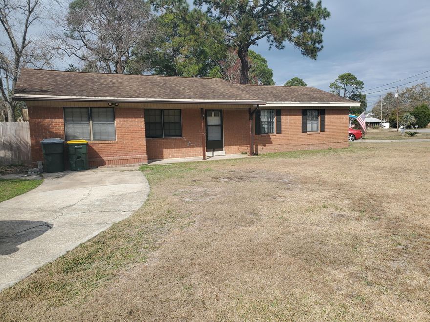 PROFESSIONAL photos coming soon. This charming brick home with 4 bedrooms and two baths is situated on a large corner lot in a well-established neighborhood, convenient to schools, shopping, and bases.  With multiple living spaces, this home has endless possibilities! The kitchen's gas range, stainless appliances, convenient breakfast/coffee bar, pantry, and bright cabinetry appeal to the home chef. In addition to the traditional living room, the home has a large flex space that can be used as a family room, game room, formal dining room, or however you wish to use it! The completely updated hallway bathroom has an oversized tile shower, porcelain tile floor, and new vanity. The primary bedroom has a full bathroom en suite, with attractive tile accents and tile flooring. A large 4th bedroom (with brand new carpet) is off the dining area and separate from the others, providing space for guests or teens. No HOA!

The fenced backyard boasts a large above-ground pool for those Florida summers. The shed provides convenient storage for garden equipment and designated storm shutters. Sprinkler system has new pump. Water heater 2020, HVAC 2023, freshly painted interior, copper wiring. 


