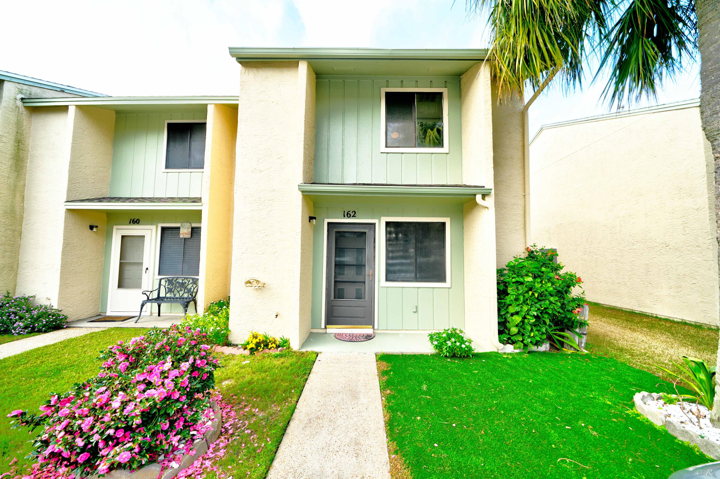 Fully furnished 2 bed, 2.5 bath end unit with two additional heated/cooled bonus spaces at the gated Gulf Highlands complex! This unit is situated directly across the heated pool. Gulf Highlands features 11 pools, including a gulf front pool with a pool house! This complex also boasts mini golf, shuffleboard, tennis, a fitness room, and more. This townhome features beautiful new LVP flooring and mirrored walls on the main floor. The living room, dining area, and kitchen feature an open floor plan that is great for hosting family and friends. The laundry room is located on the main floor and features a walk-in shower. There is also a half bathroom downstairs for the ultimate convenience.