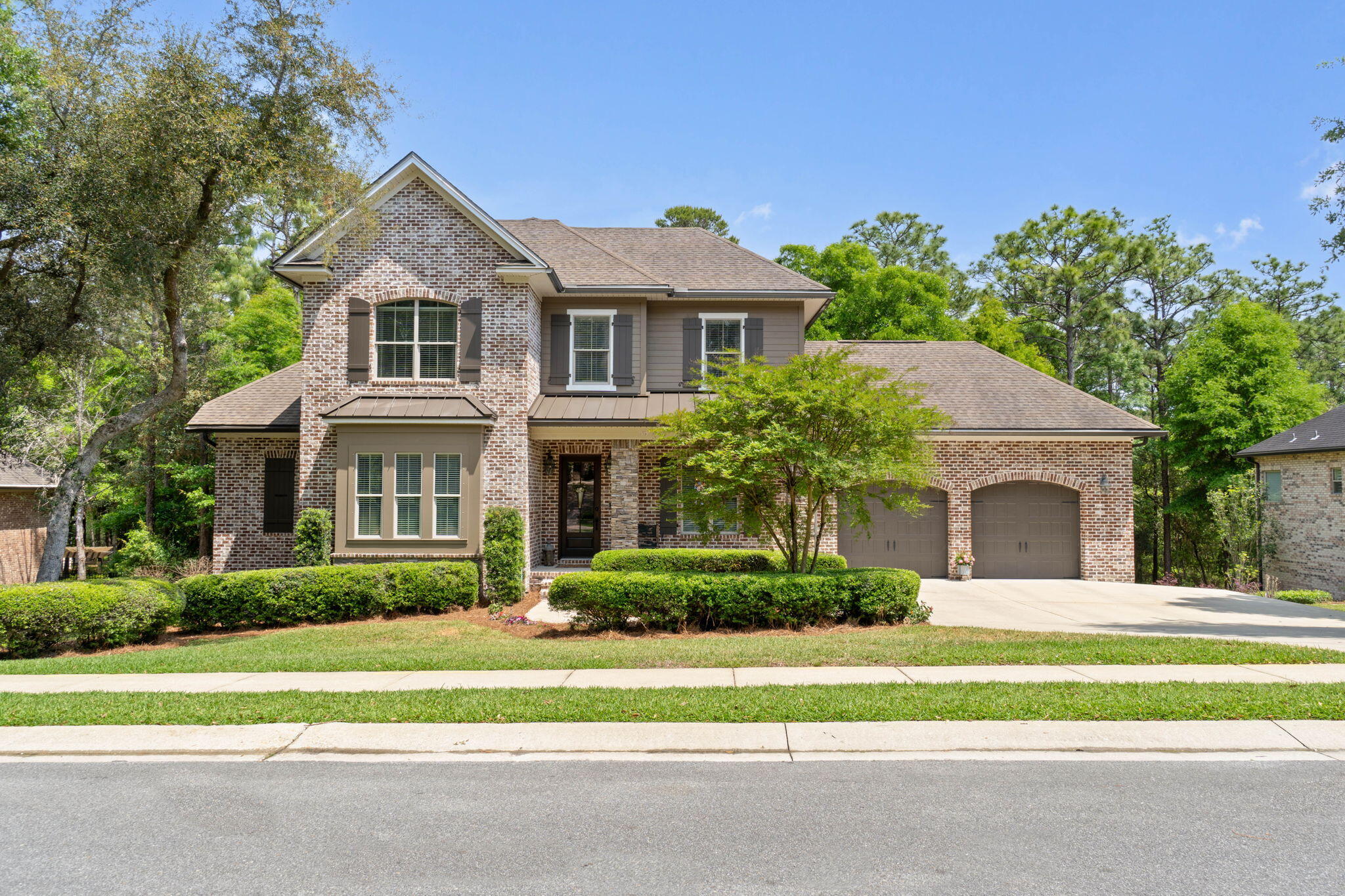 Welcome to this beautifully maintained Randy Wise-built Hillside floorplan located in the highly sought-after Swift Creek neighborhood. This spacious 5-bedroom, 5-bathroom home sits on a picturesque lot that backs up to Shaw Still Creek, once part of a historic turpentine farm -- offering both character and tranquility.Lovingly cared for by the original owners over the past 12 years, this home has been thoughtfully updated throughout. Highlights include a fully finished walk-out basement, upgraded HVAC systems and water heaters, aluminum fencing around the generous backyard, and charming touches like antique doors and lime-washed interior accent brick for a warm, custom feel. The main level features a bright and functional layout with the kitchen, living room, office, and primary suite all conveniently located on one floor. Upstairs, you'll find three additional bedrooms, including a private en-suite and access to walk-in attic storage.

Downstairs, the expansive basement adds 1,900 square feet of heated and cooled living space, including a second kitchen, bedroom (currently used as a gym), home theater (used as a guest room), Jack and Jill bathroom, family room, and a flex space perfect for hobbies or additional entertaining. A concrete block storage room doubles as a storm shelter, providing peace of mind.

Swift Creek is a vibrant community offering top-notch amenities including tennis courts, a swimming pool with clubhouse, lake park, and children's playgroundall just steps from your front door.

This one-of-a-kind home blends timeless design, modern upgrades, and natural beautyschedule your private showing today!