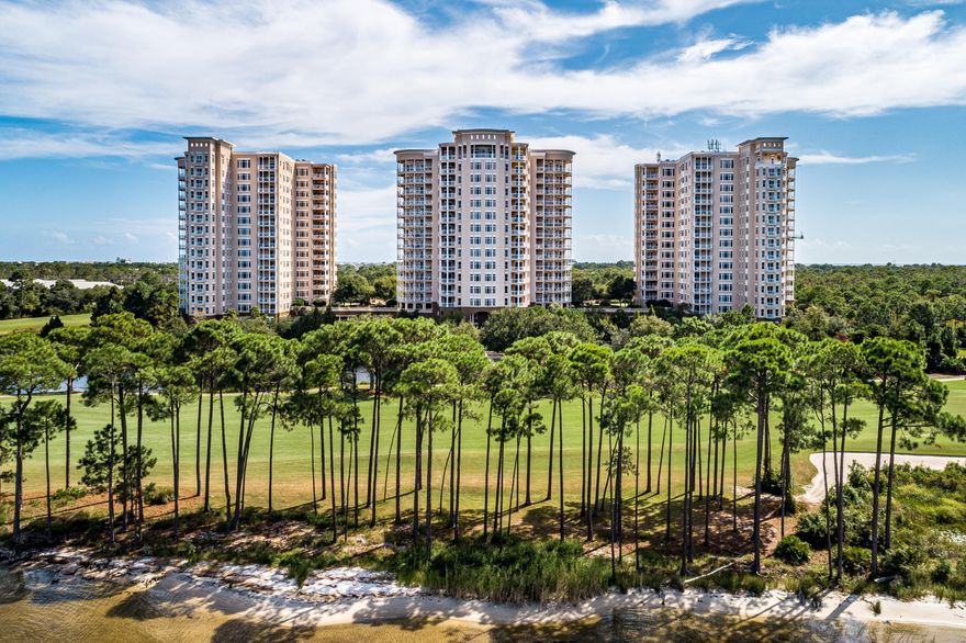 Stunning 'Castleton' unit in the exclusive One Water Place in Kelly Plantation. This popular floor plan offers expansive views of the Choctawhatchee Bay and Kelly Plantation's signature Fred Couples designed golf course all from the wrap around terrace and main living areas. In addition, this beautiful residence has panoramic views of the Gulf of Mexico and the City of Destin. Luxurious living at it's finest in Unit 1108, boasting hardwood and travertine flooring throughout, extensive crown molding, 10-ft ceilings, fireplace and more. The expansive kitchen is a chef's delight, with gorgeous cabinetry, a large island and Viking appliances. This unit also has two assigned parking spaces in the garage near the elevator as well as a large, climate-controlled storage unit located right outside