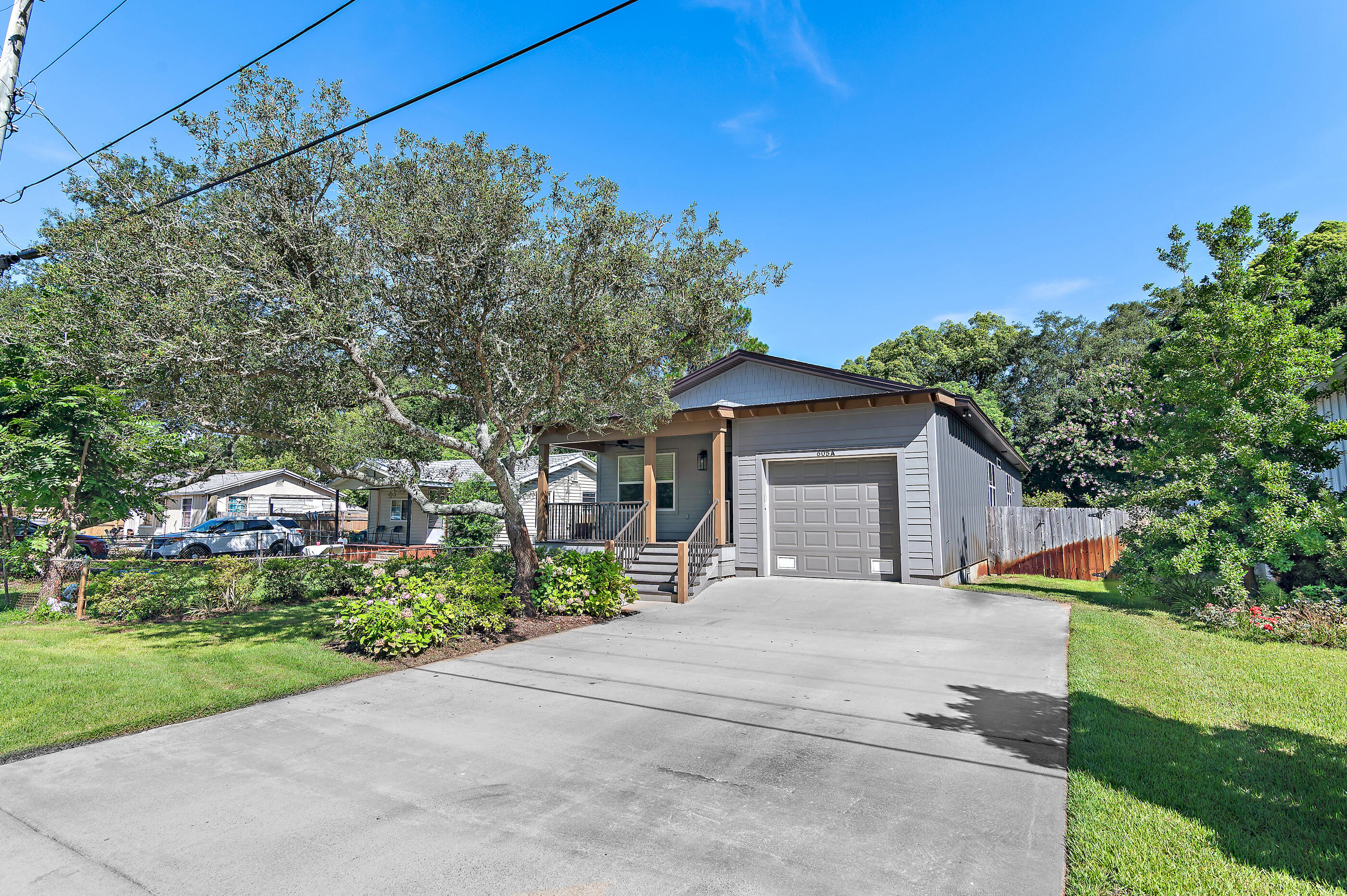 Welcome to this newly built 2022 single-family home offering the perfect blend of modern style, functional design, and unbeatable location. Featuring 4 bedrooms, 3 full baths, and nearly 1,700 square feet of heated living space, all thoughtfully arranged on a single level, this home is move-in ready and ideal for comfortable coastal living. Step inside to find durable vinyl plank flooring, decorative drywall finishes, and an open-concept layout perfect for everyday living and entertaining. The Hardie Board exterior and metal roof offer low-maintenance durability and classic curb appeal. The total area under roof is 2,214 sq ft, including covered outdoor spaces and utility areas. The home has a two-car garage and large fenced in backyard with room to park a boat. Centrally located in.... Centrally located in Destin, this home is just minutes from Joe's Bayou Boat Launch, Destin Elementary School, The Destin Harbor, and all the shopping, dining, and world-famous white sand beaches that make Destin such a sought-after place to live. Whether you're a full-time resident, 2nd home buyer, or investor, this like-new 2022 build offers the ideal mix of location, quality, and the coastal lifestyle you've been looking for.