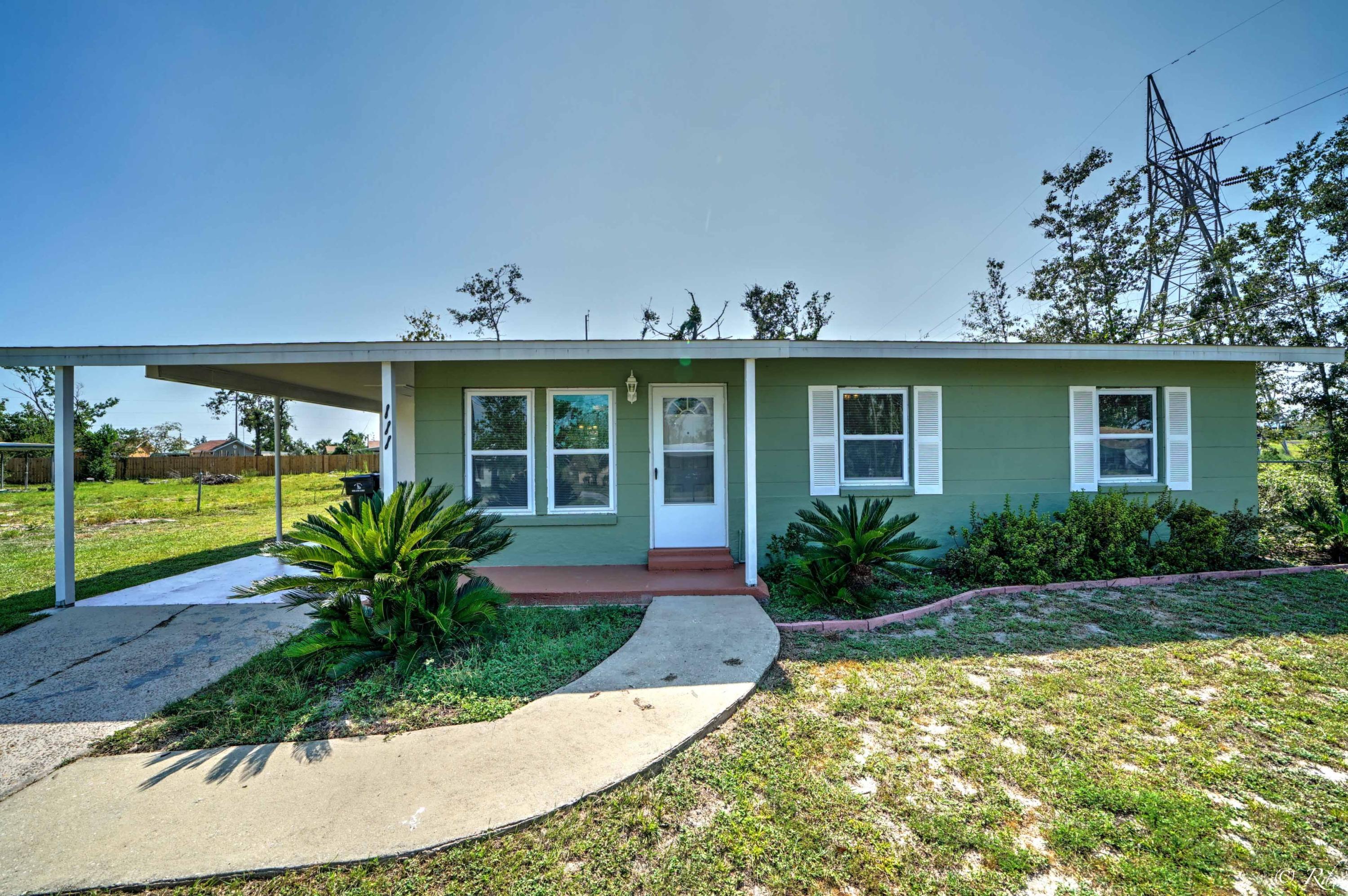 Adorable, move-in ready home. This sturdy block home has had a complete remodel. NEW STAINLESS APPLIANCES ARRIVING SEPT. 11TH!!. New roof, sheetrock, lighting, doors, windows, floor, paint, cabinets, HVAC countertops and more. Not a stone left unturned! New tankless hot water heater installed. Why rent when you can buy? Laundry room is located under the carport and is Heated and Cooled. Nice quiet street, walking park nearby. Short drive to TAFB.